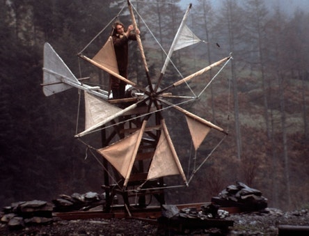 Person working on the cretan wind turbine - CAT in the 1970s