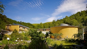 The Wales Institute of Sustainable Education (WISE) was built in 2010 as a home to CAT’s postgraduate courses and training. It was designed to have a very low environmental impact in construction and in use, and serves as an effective example and demonstration of sustainable building techniques. Credit: Tim Soar