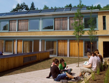 Students sitting outside the Wales Institute of Sustainable Education