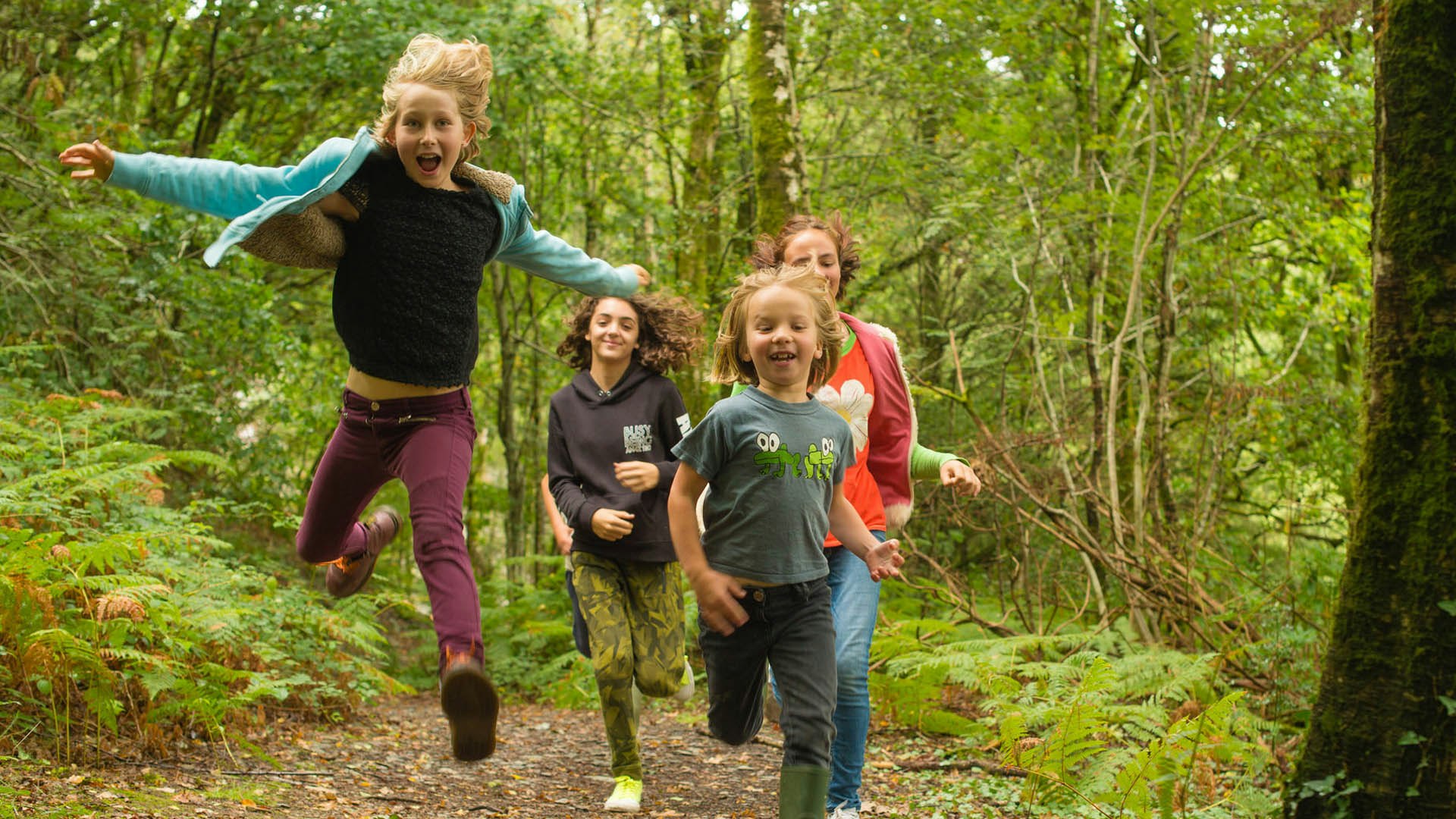 kids running on the quarry trail