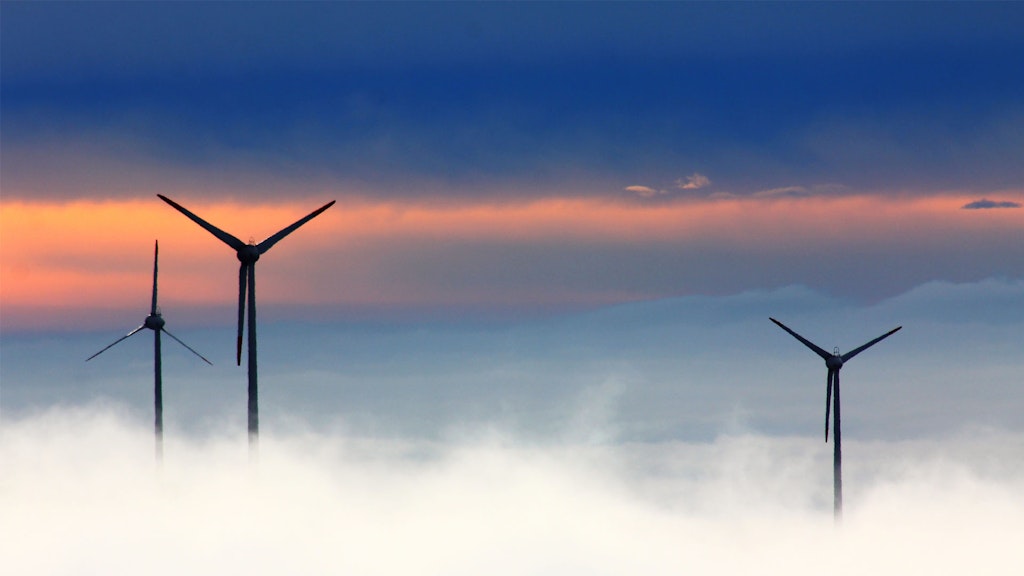 wind turbines at dawn