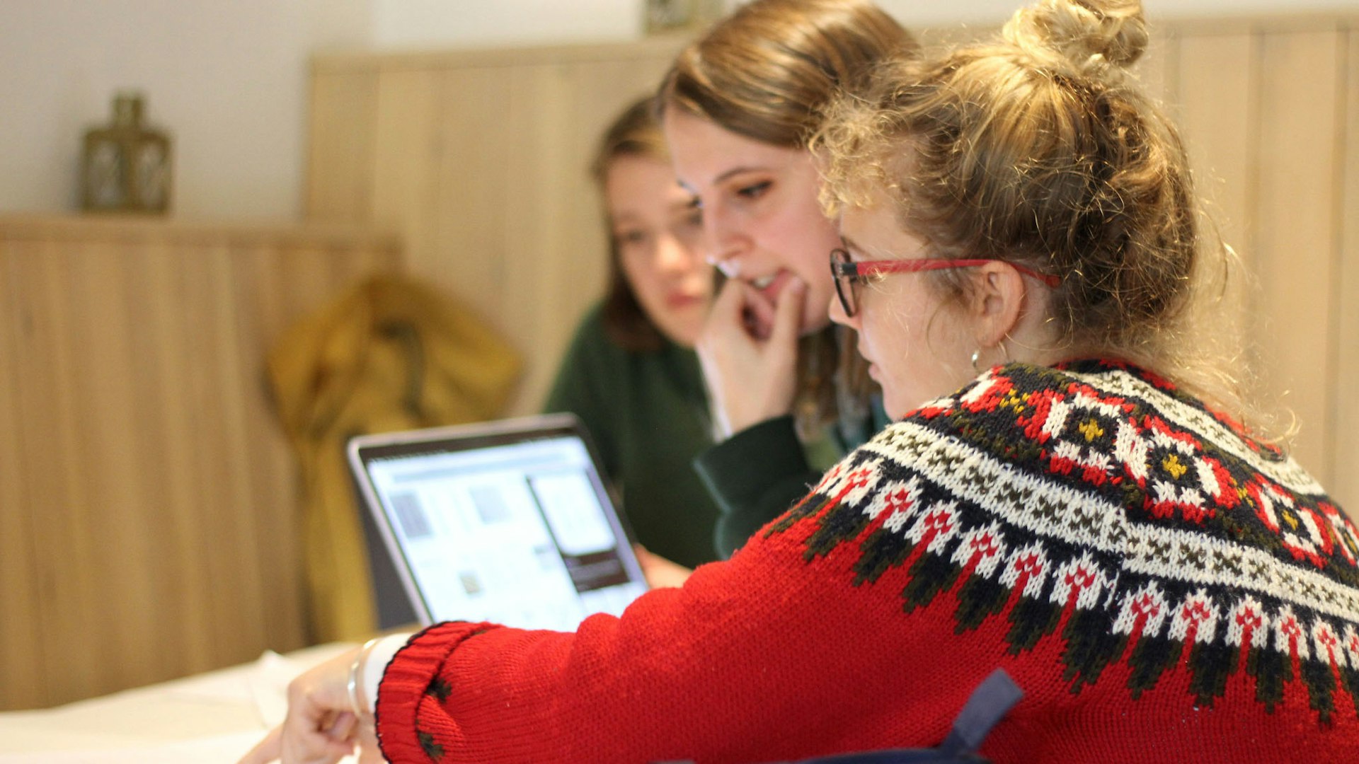 Students at CAT looking at a computer