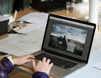 Architect student working on their design on a computer