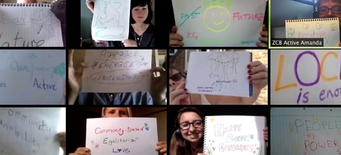Screenshot of people holding up messages about climate change solutions