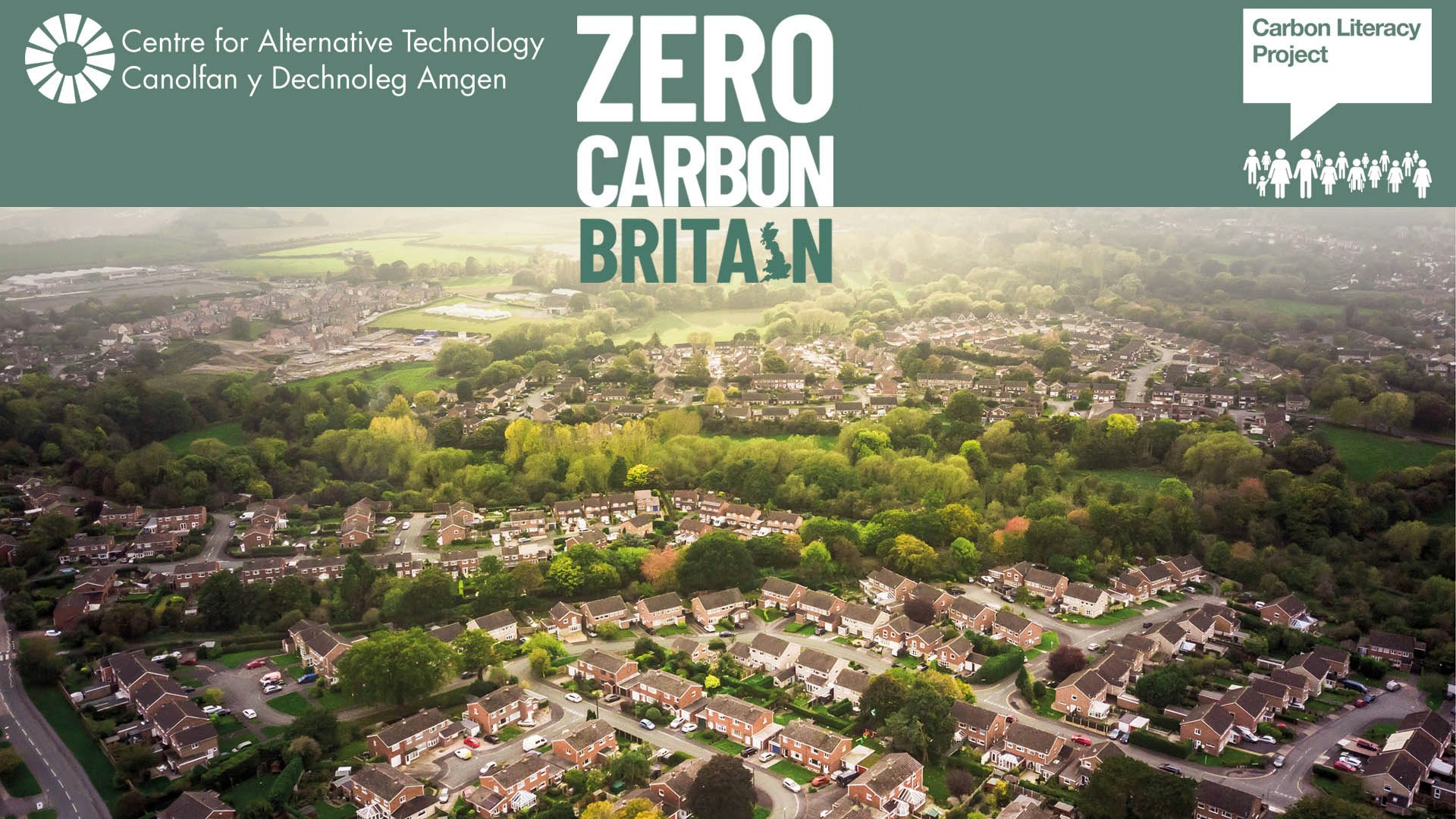 Aerial view of a town with Zero Carbon Britain logo