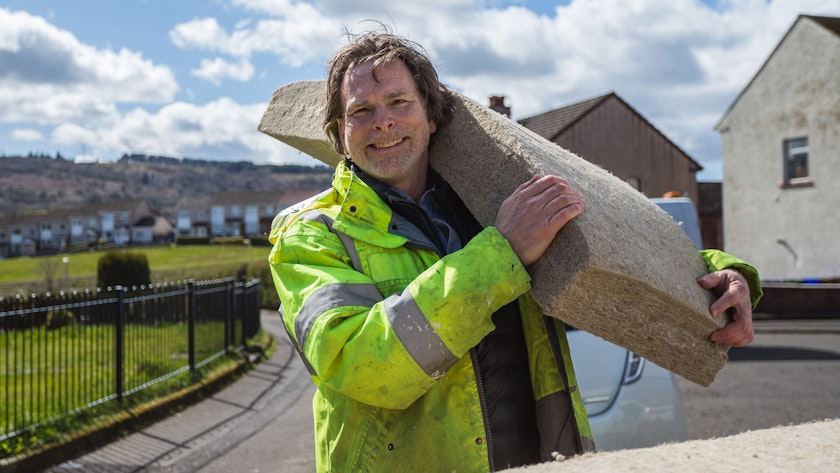 Scott holding IndiTherm, a flexible thermal insulation 'batt' made from UK-grown crops