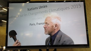 Projector showing Paul Allen at COP21 in Paris