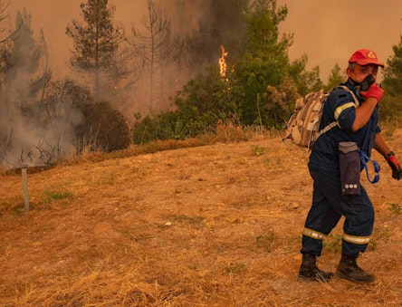 Heatwaves have become more frequent and more intense. Image shows wildfires in Evia Island, Greece, August 2021. Nicolas Economou / Shutterstock