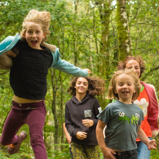 Children running on the Quarry trail at CAT