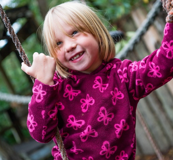 Close up of a child in the CAT playground