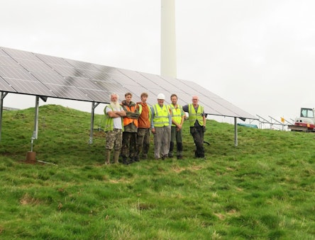 The new solar project begins to take shape – Project Manager Tim Brewer (far left) with some of the installer team.
