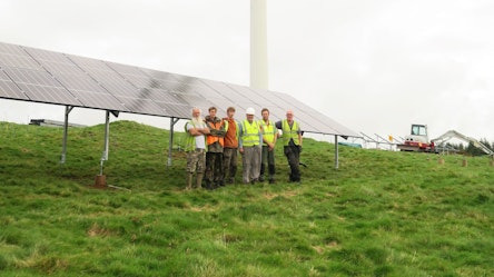 The new solar project begins to take shape – Project Manager Tim Brewer (far left) with some of the installer team.