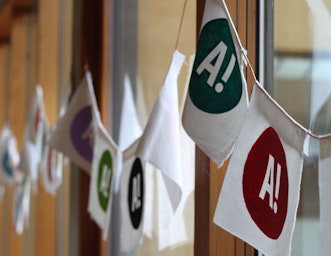 Bunting with with ACAN's logo set up in the WISE building