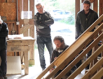 Nick Parson demonstrating installing insulation on one of our Eco Refurbishment courses